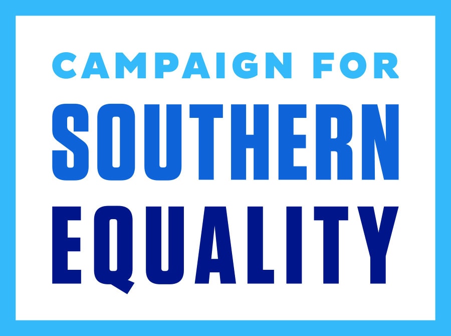A sign with blue text reads "Campaign for Southern Equality" on a white background with a blue border.