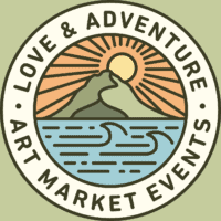 Circular logo with text "Love & Adventure Art Market Events" surrounding an illustration of a mountain, sun, and ocean waves.