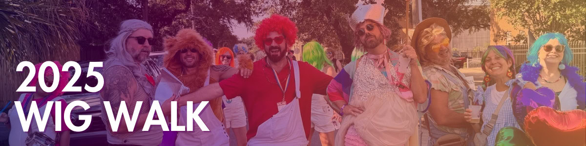 A group of adults in colorful wigs and costumes pose outdoors under a "2025 Wig Walk" banner.