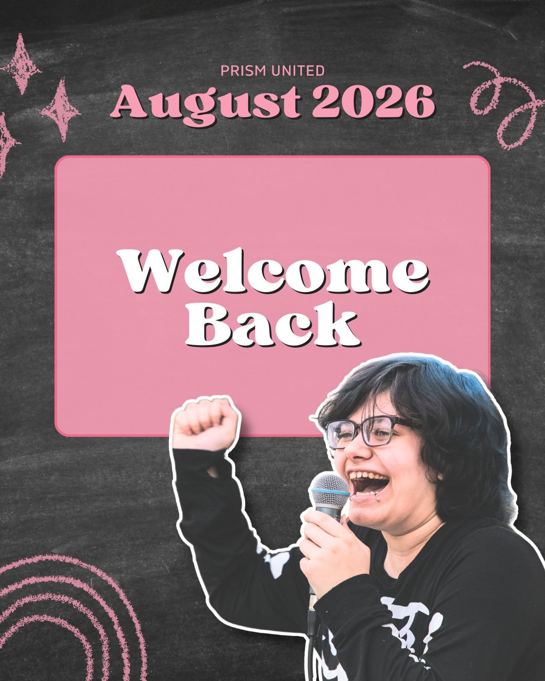 A person with glasses holds a microphone and smiles, raising a fist. Text reads “PRISM UNITED August 2026 Welcome Back” on a chalkboard background with pink accents.